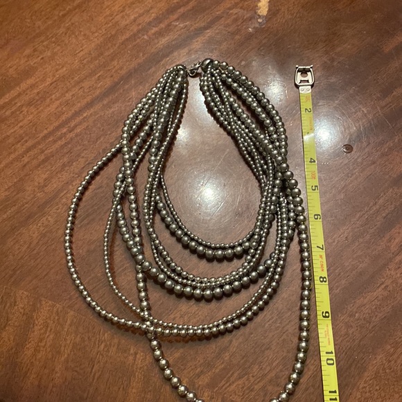 Silver toned, multi strand necklace with lobster claw clasp. - Picture 8 of 8